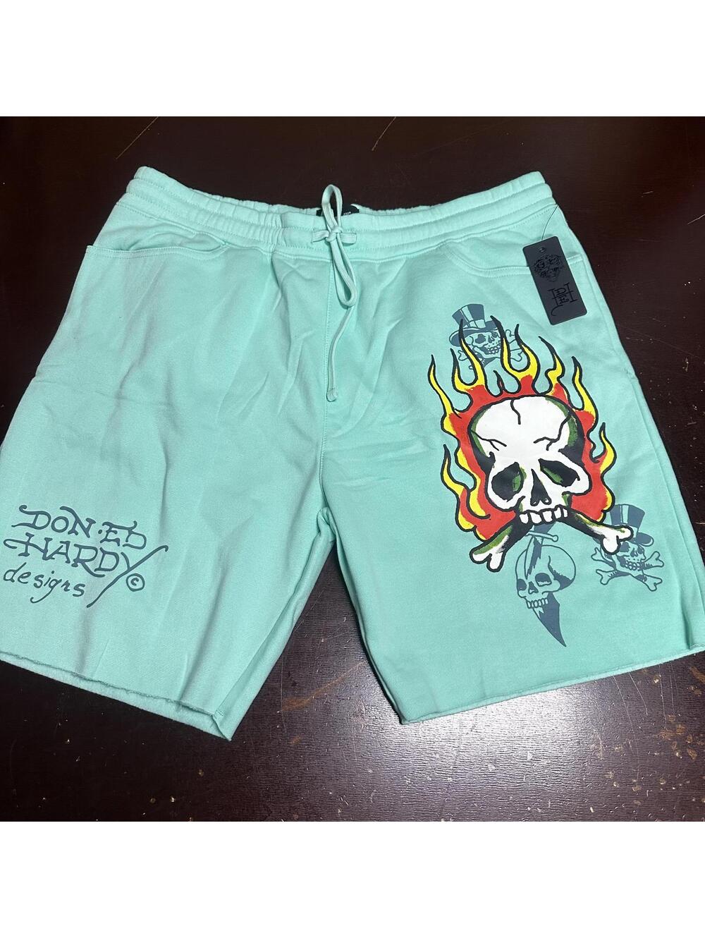 Ed Hardy, teal fire skull graphic shorts, men’s. Available in medium or large